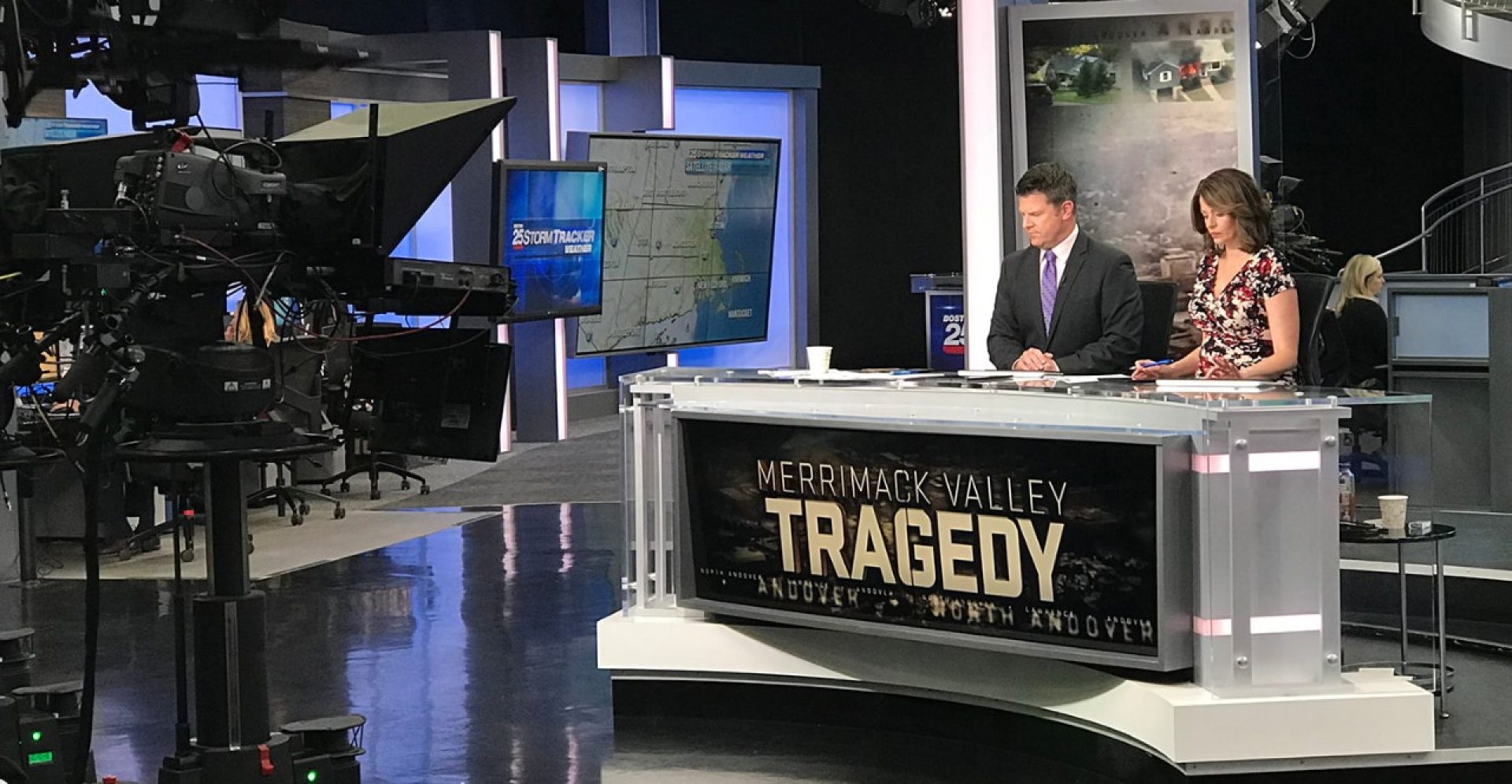 Two news anchors on set
