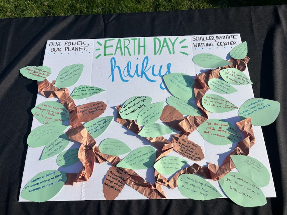 Green week 9 Earthday Haiku Poster with poems written on paper leaves