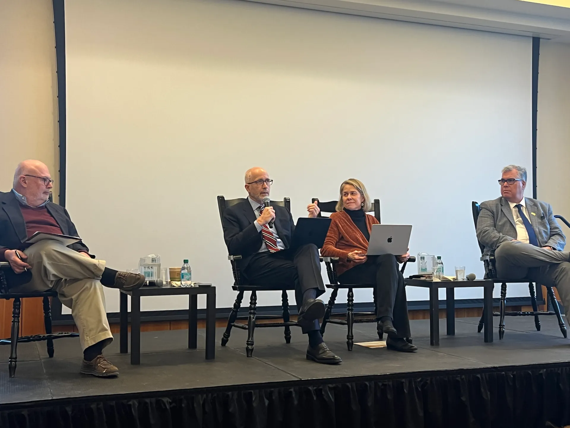 Panel 2 from left to right: Fr. Mark Massa, David Gibson, Marie Griffith, and Michael Murphy