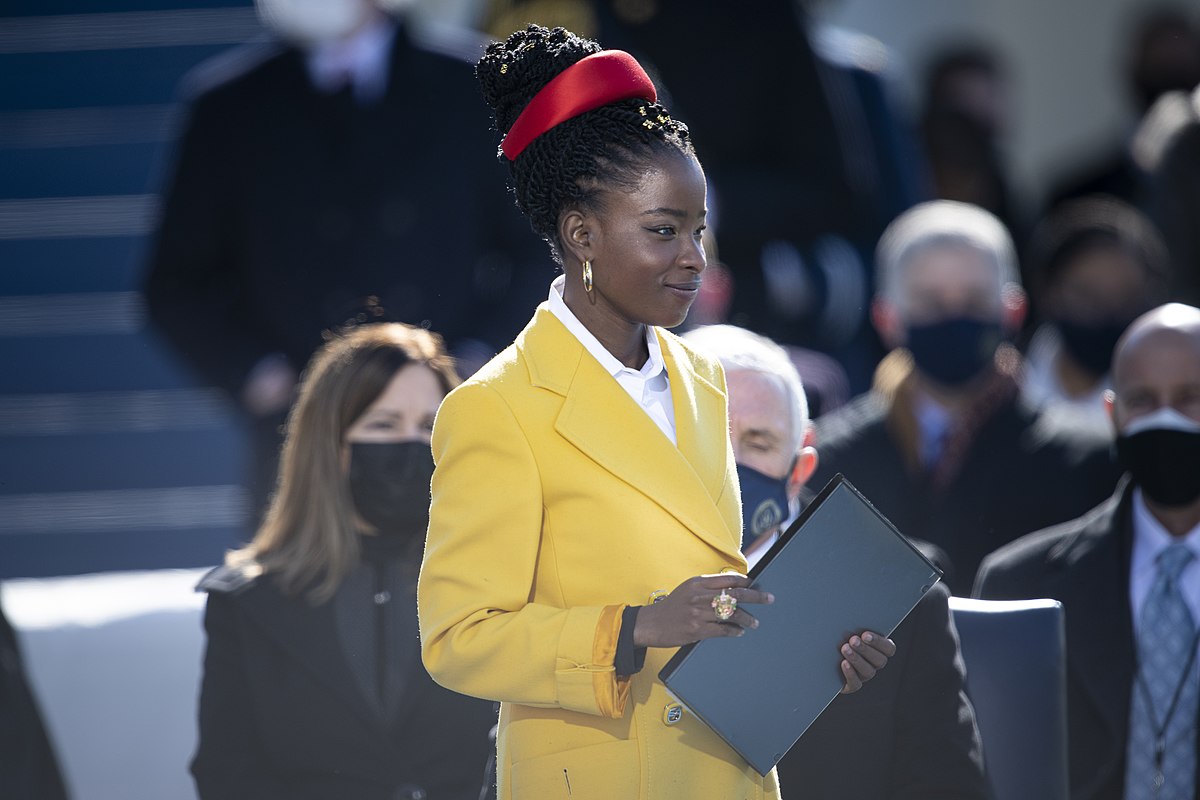 Amanda Gorman steps to the podium to recite her inaugural poem, "The Hill We Climb," during the 59th Presidential Inauguration ceremony in Washington, Jan. 20, 2021. President Joe Biden and Vice President Kamala Harris took the oath of office on the West Front of the U.S. Capitol. (DOD Photo by Navy Petty Officer 1st Class Carlos M. Vazquez II)