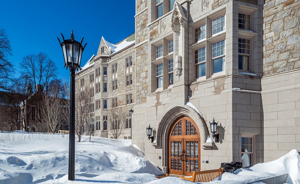 Exterior of the Woods College in winter