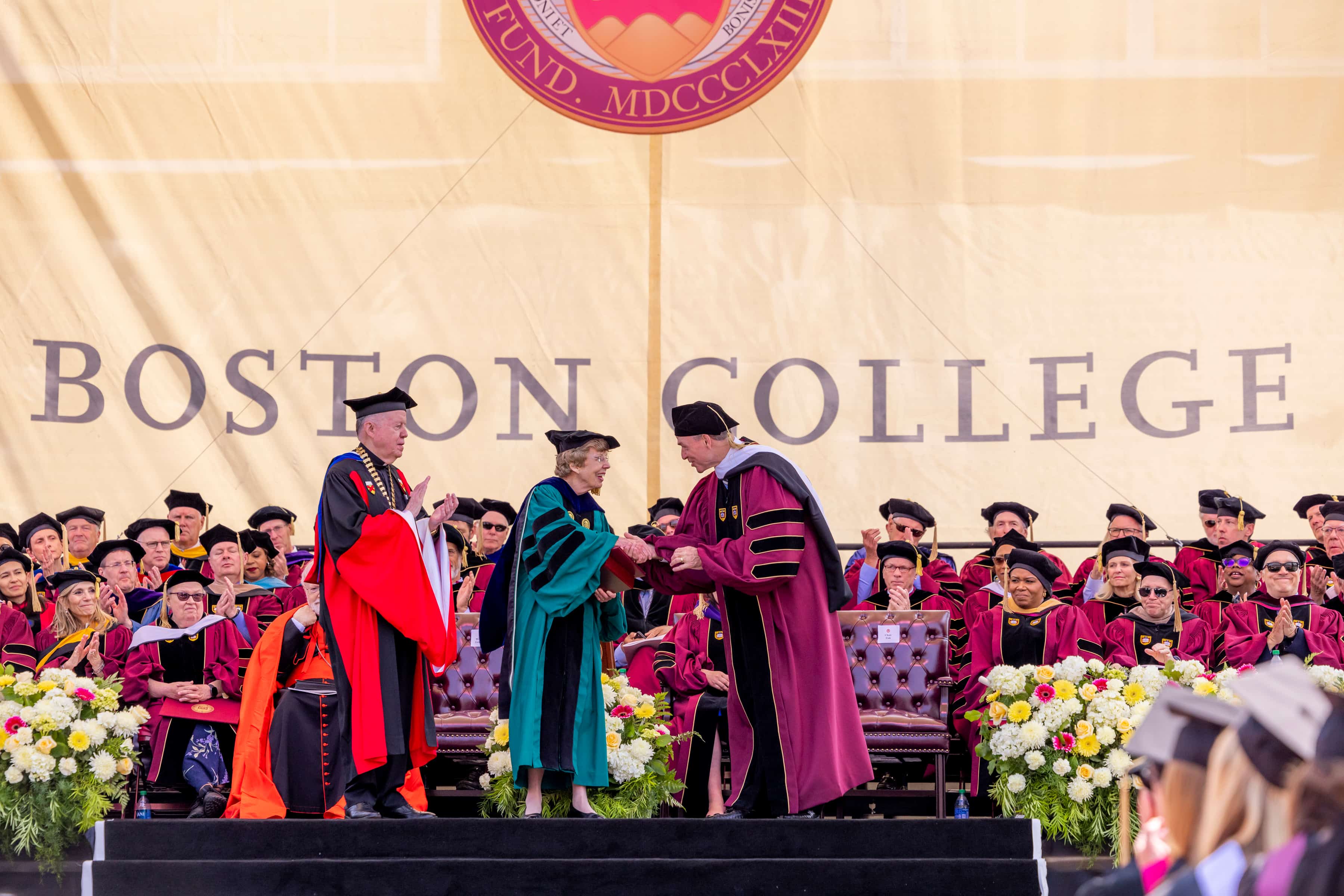 Kearns Professor Mary Walsh receives the Saint Robert Bellarmine, S.J., Award.