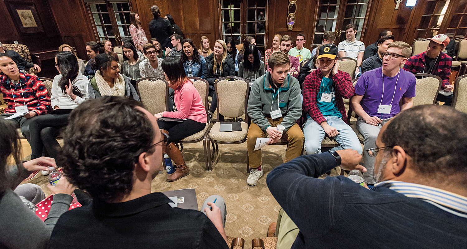 Large group of students sitting in circle