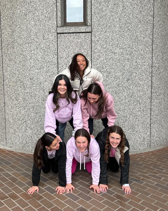 Students forming a pyramid