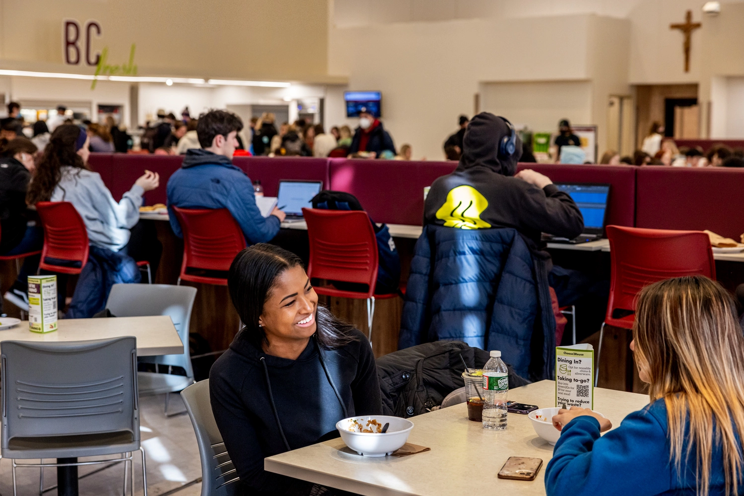 Students enjoying a meal in a BC dining hall.