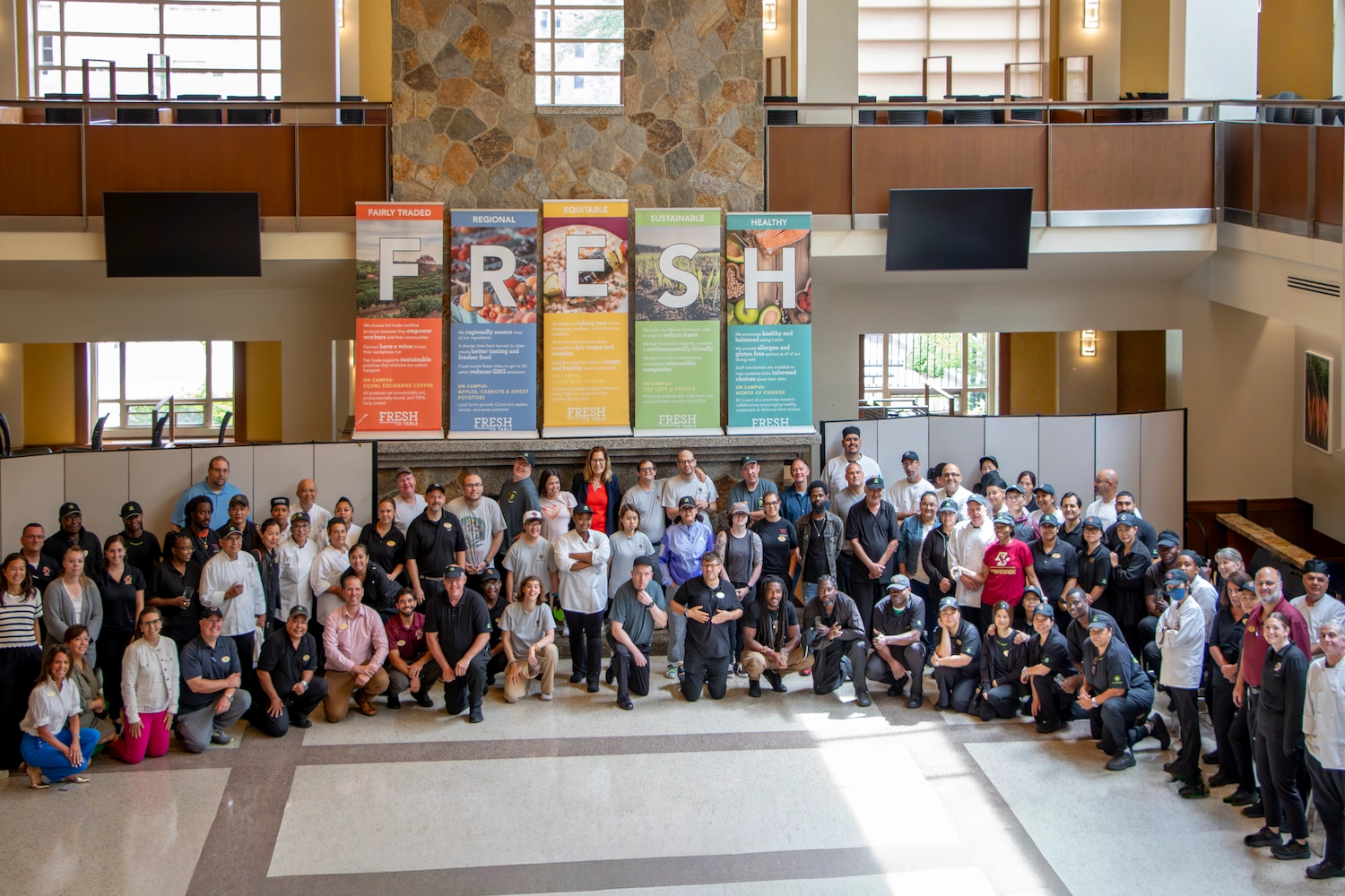 Full BC Dining Team posed in the Lower Live dining hall.