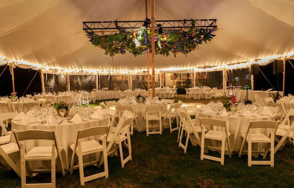 Event seating under tent in garden