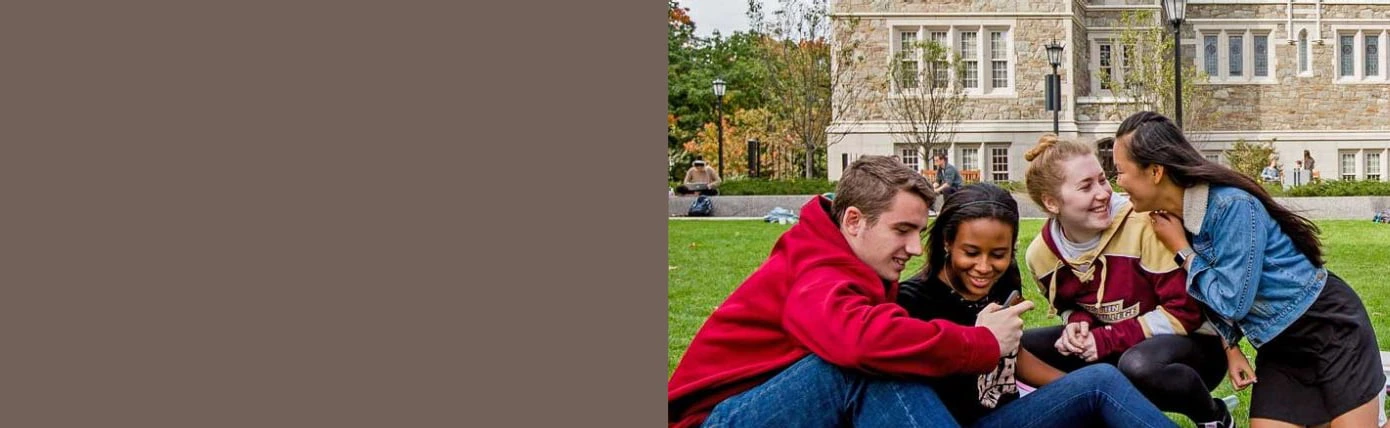 students looking happy on the lawn