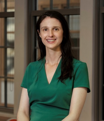 Portrait of Vanessa Conzon, newly appointed Assist. Prof. M&O (CSOM) in a classroom in Fulton Hall.
