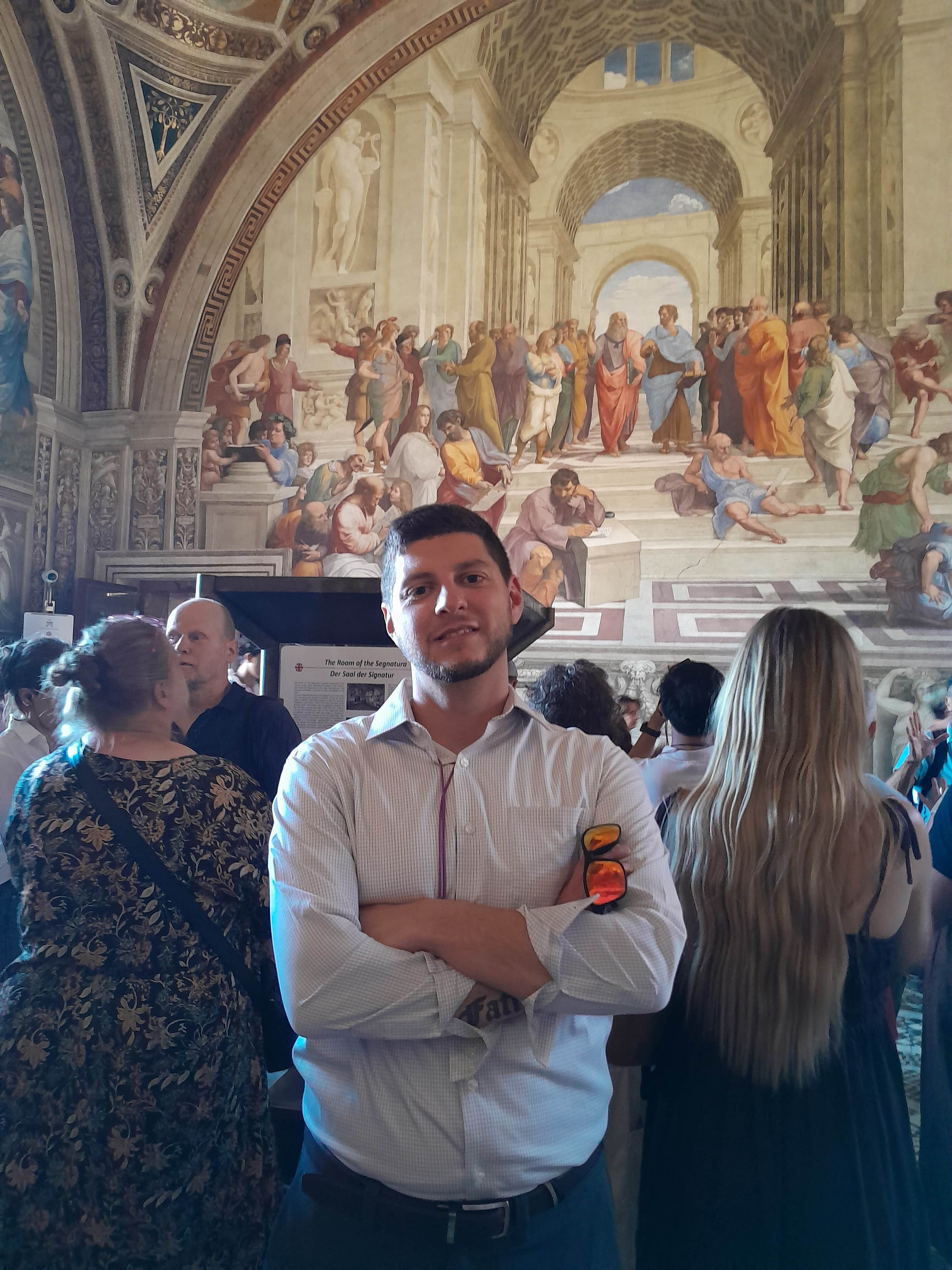 Matthew Clemente in front of Raphael's "The School of Athens"