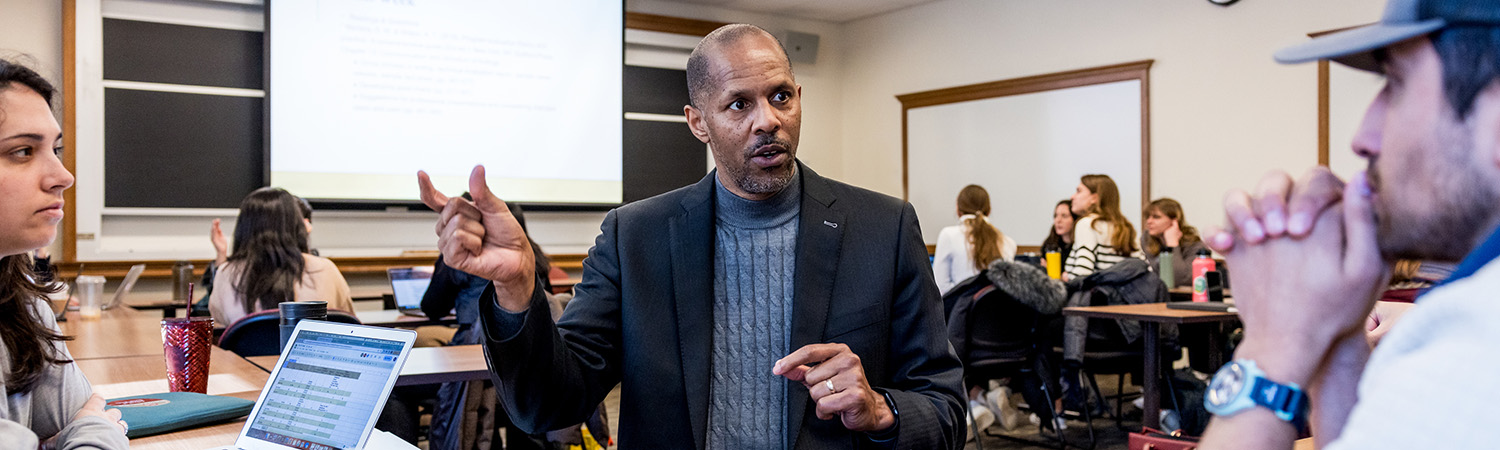 Robert Motley teaching in classroom