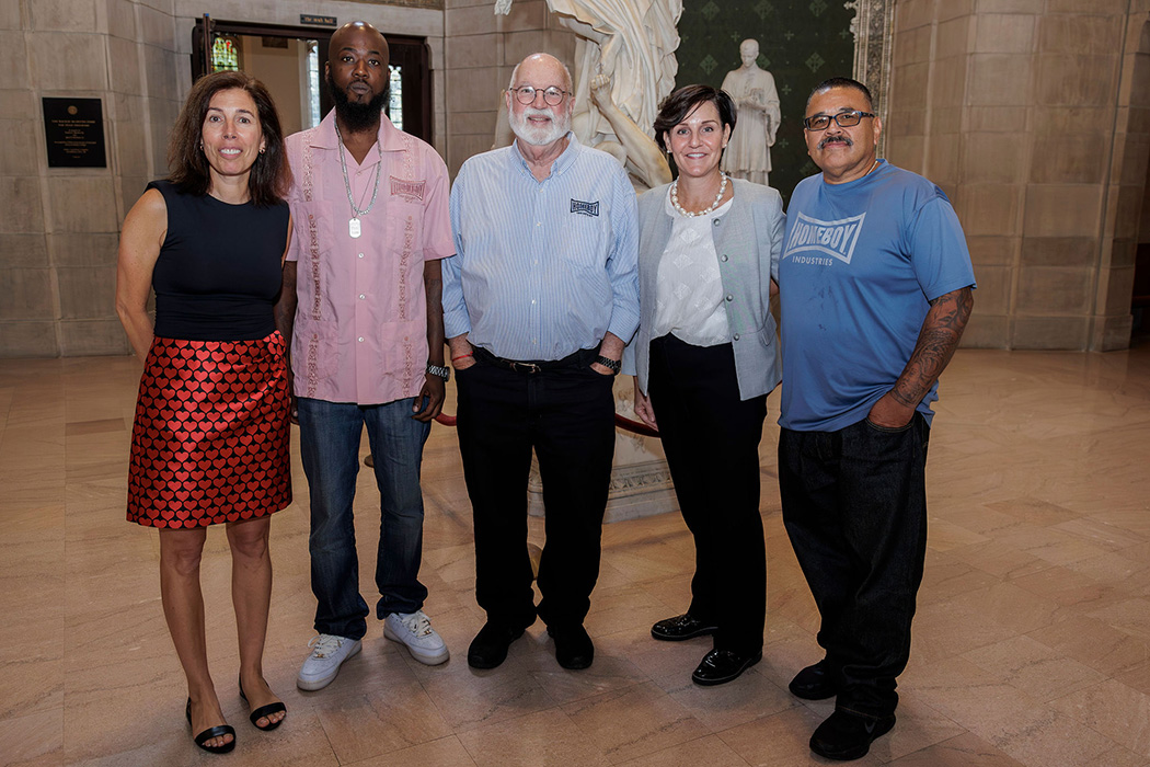 A group photo featuring Rocío Calvo, Spencer Edwards, Father Gregory Boyle, Teresa Schirmer, and Rafael Chavez.