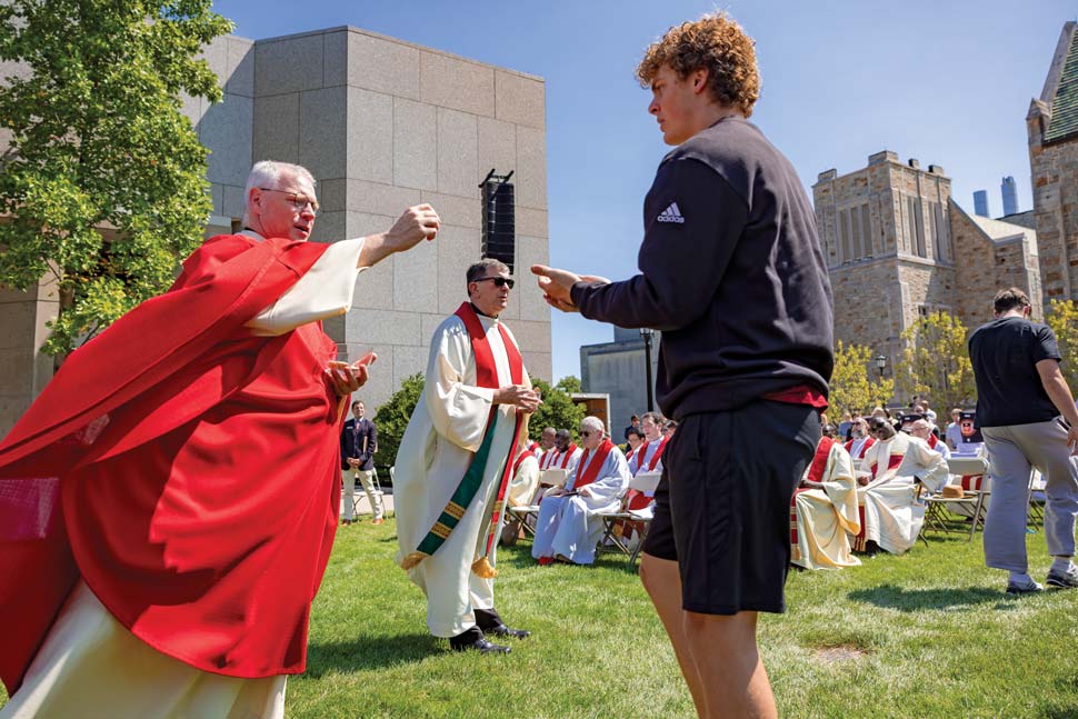 Fr. Butler and congregation on the O'Neill Plaza