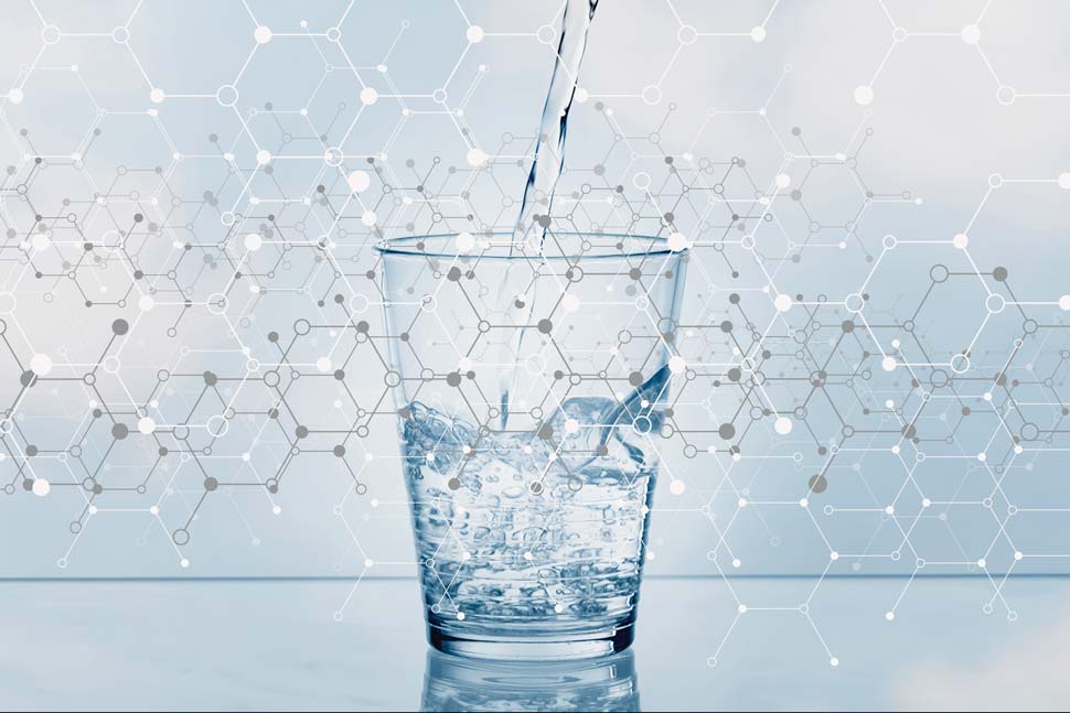 Photo illustration of chemical compound references overlaying a glass of water