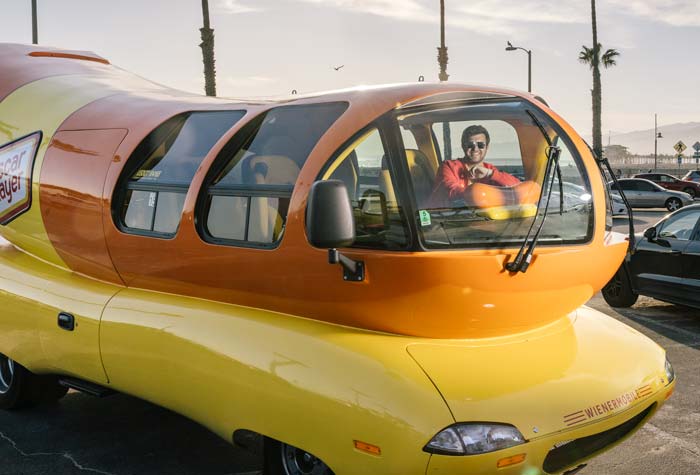 Harrison photographed with the Weinermobile in the background in Santa Monica