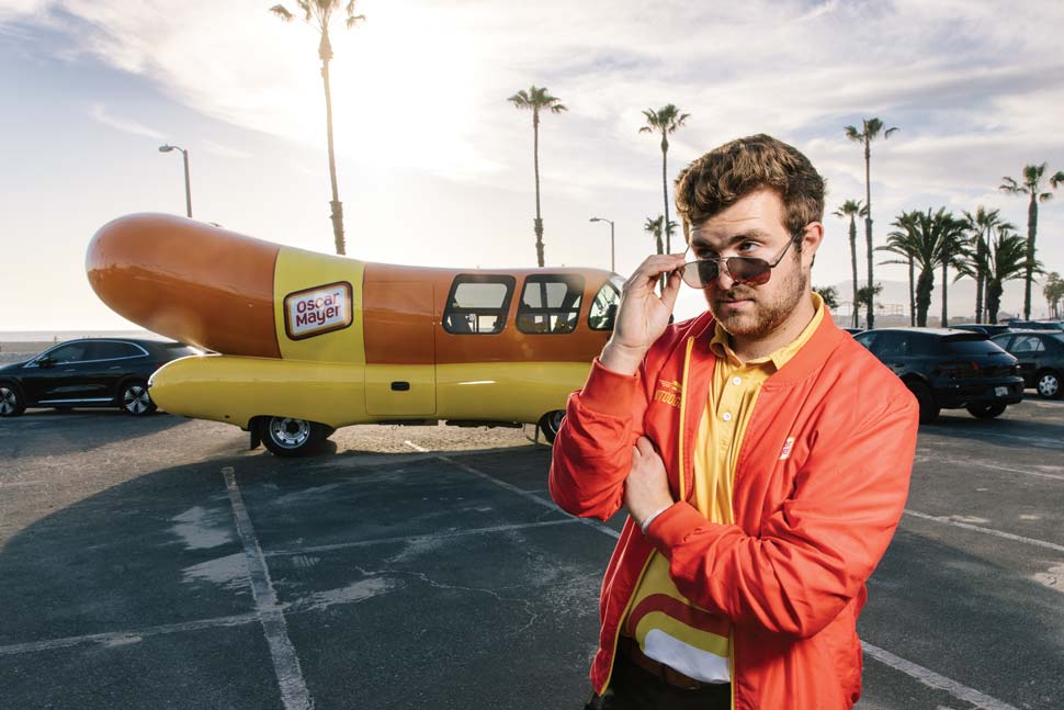 Harrison photographed with the Weinermobile in the background in Santa Monica