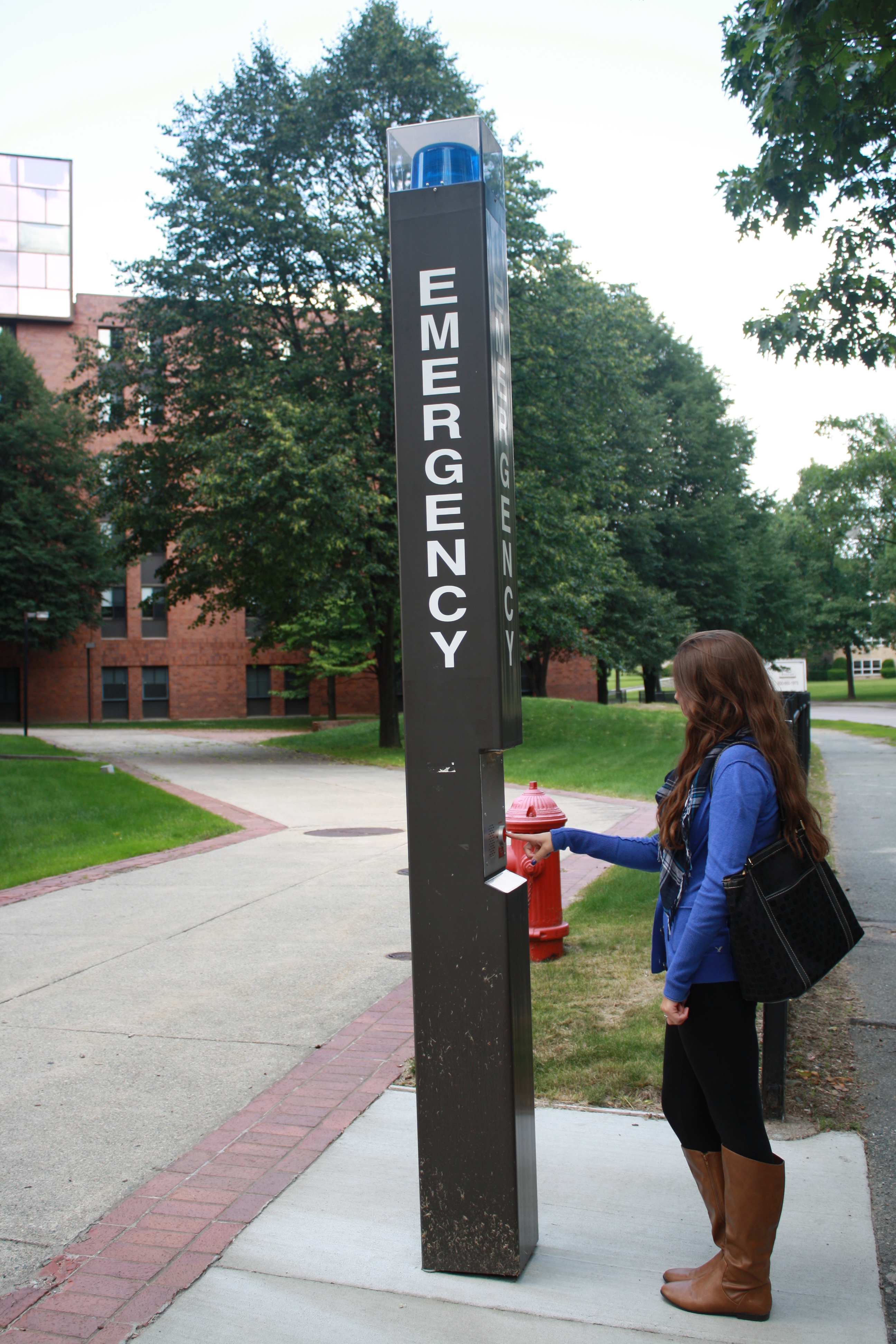 Person at blue light stand