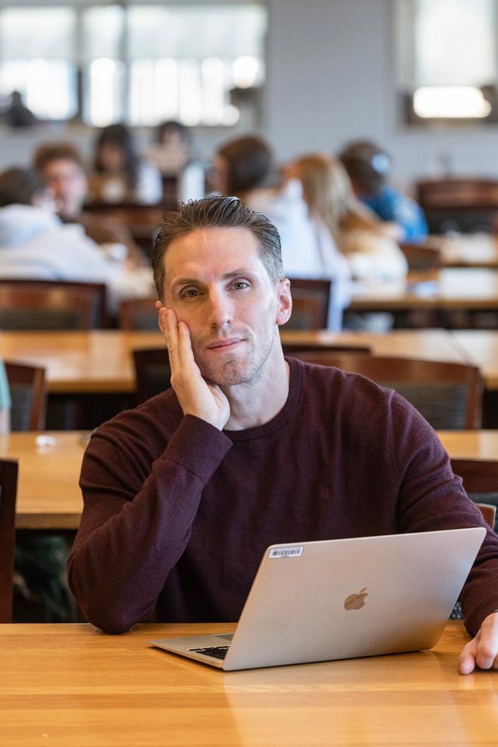 A student working on a laptop