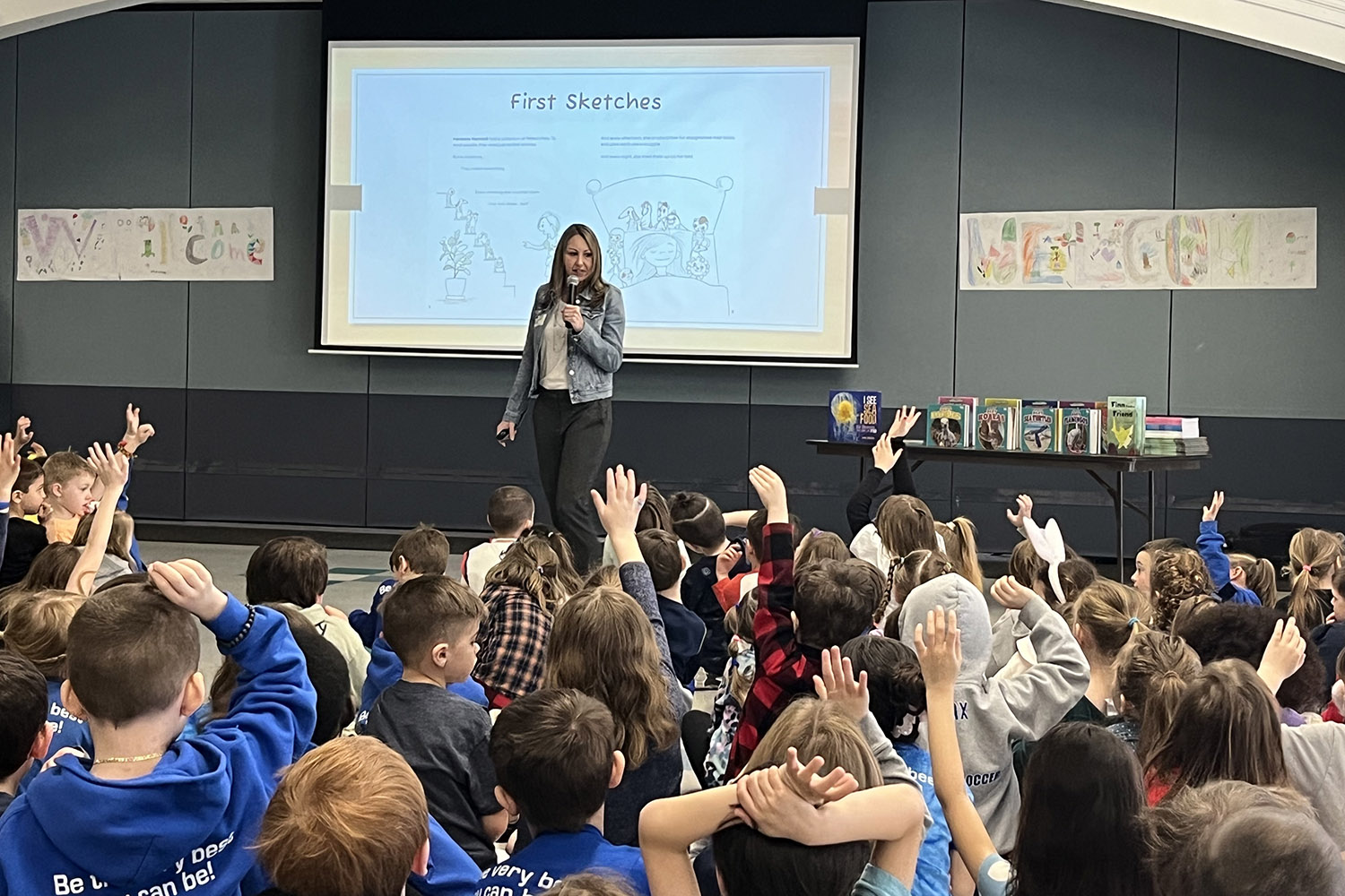 Jenna Grodzicki teaching in front of a classroom