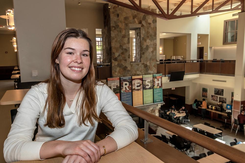 Jane sitting in the dining hall