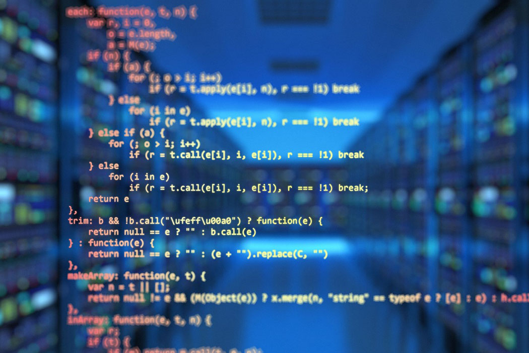 photo illustration of computers and code