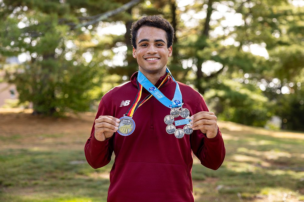 James Redding wearing two medals