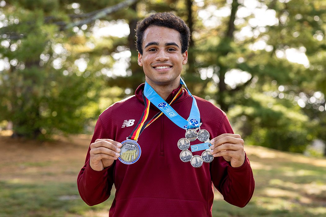 James Redding wearing two medals