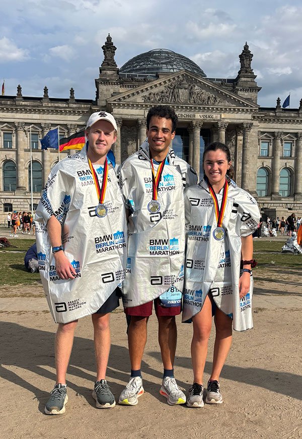 James and two friends post-marathon