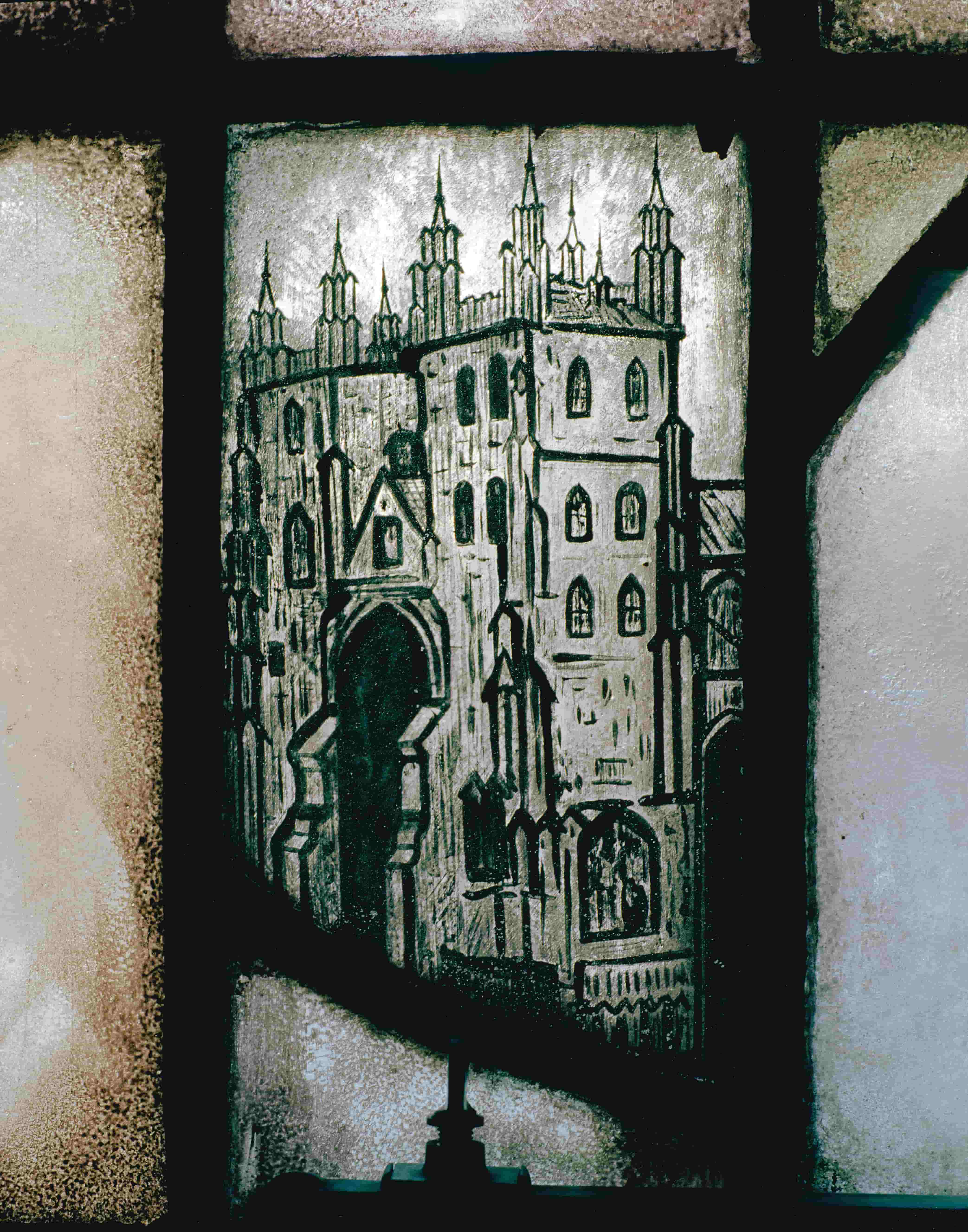 A mysterious Gothic building depicted in stained glass