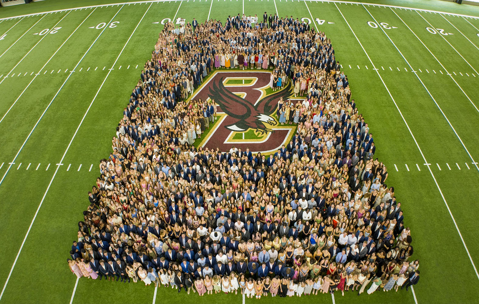 the senior class posed around the BC logo 