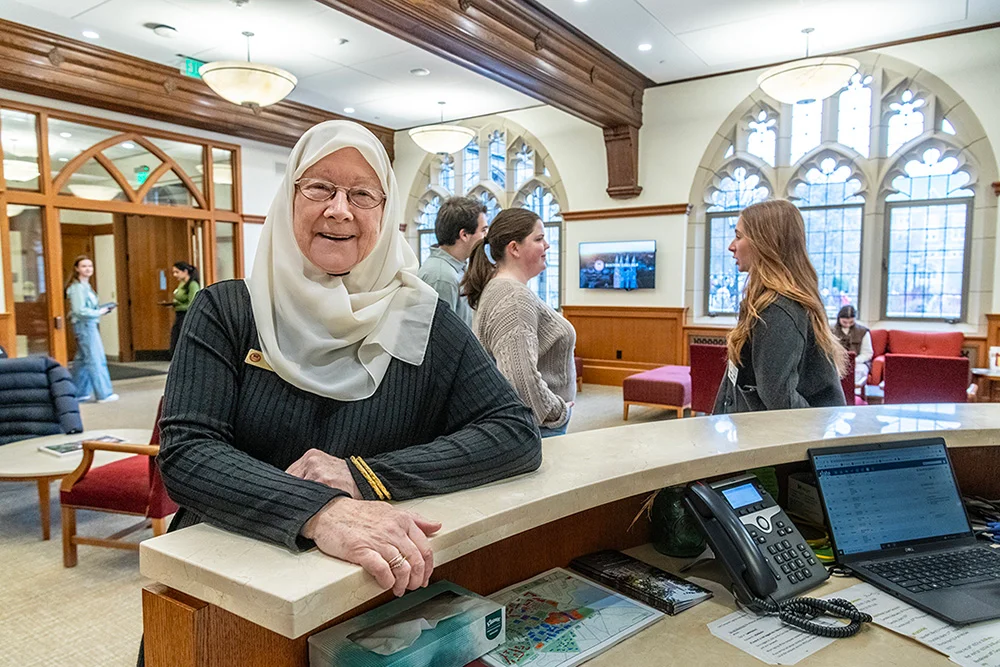 Linda Reams standing behind her desk