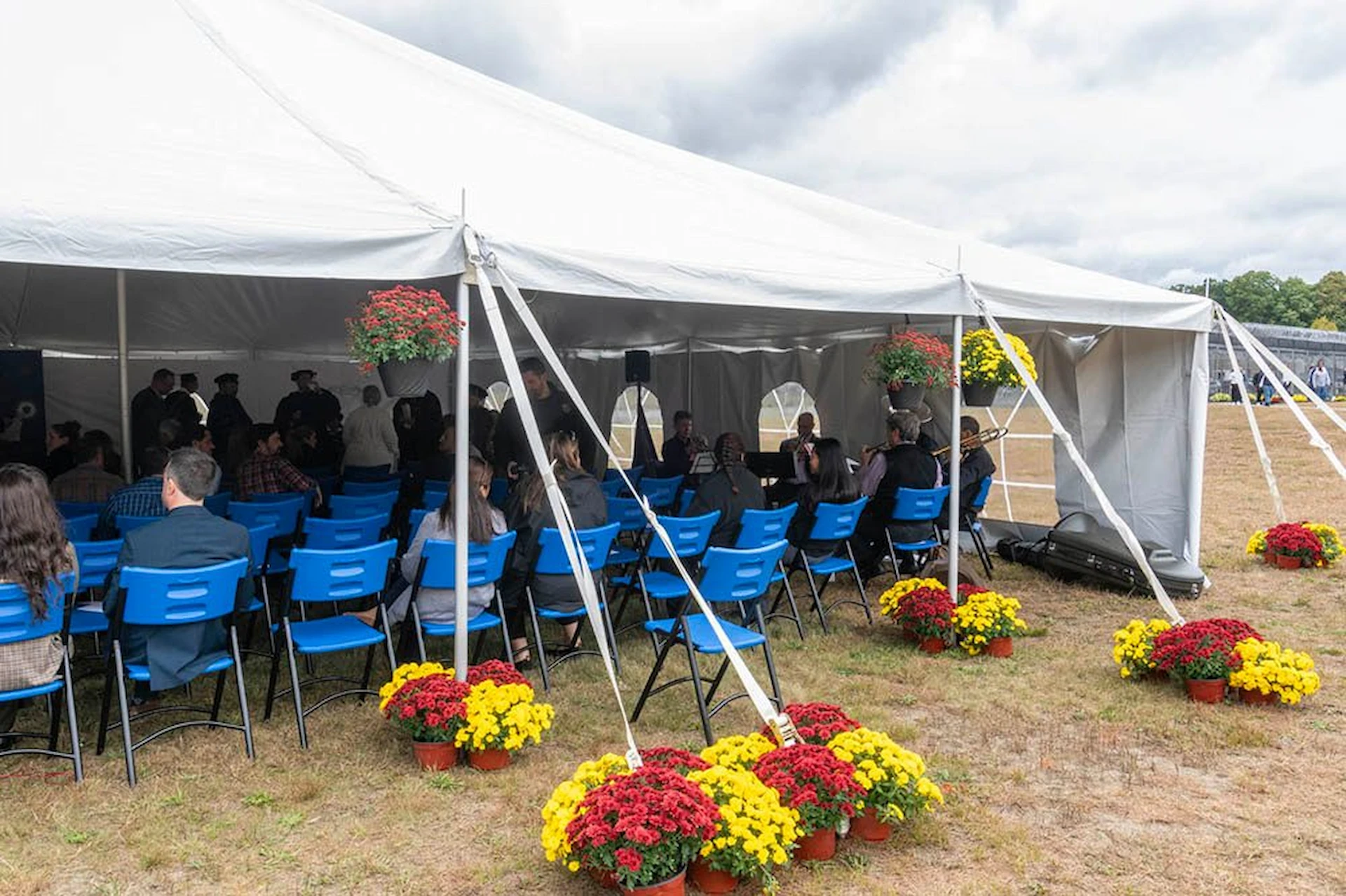 A tent set up for a graduation ceremony