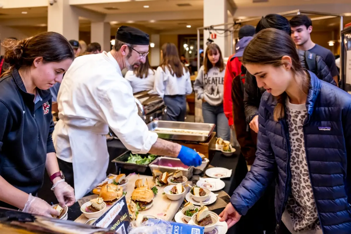 Students and chefs in dining hall